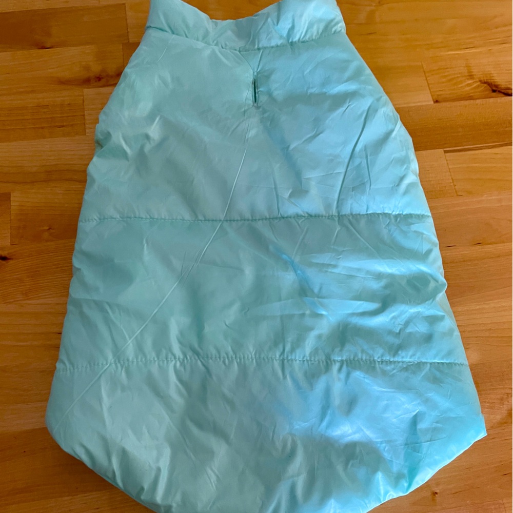 Puffy aqua color, light weight jacket for your furry friend.